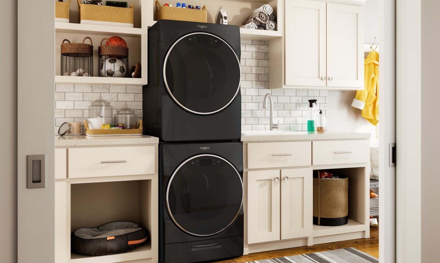 A stacked washer and dryer arrangement pictured in the source sweater-care guide.