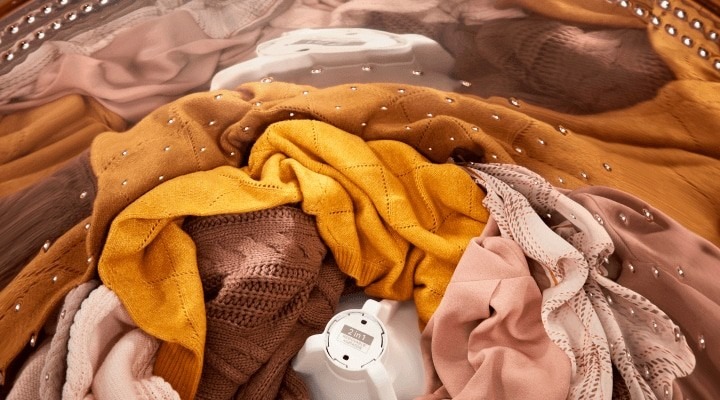 Delicate clothing in a washer pictured in the Whirlpool guide.
